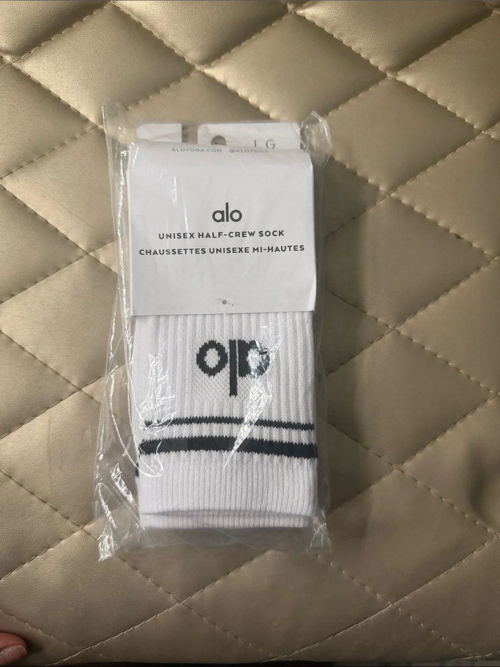 ALO Yoga White Half-Crew Socks with Black Stripes and Logo